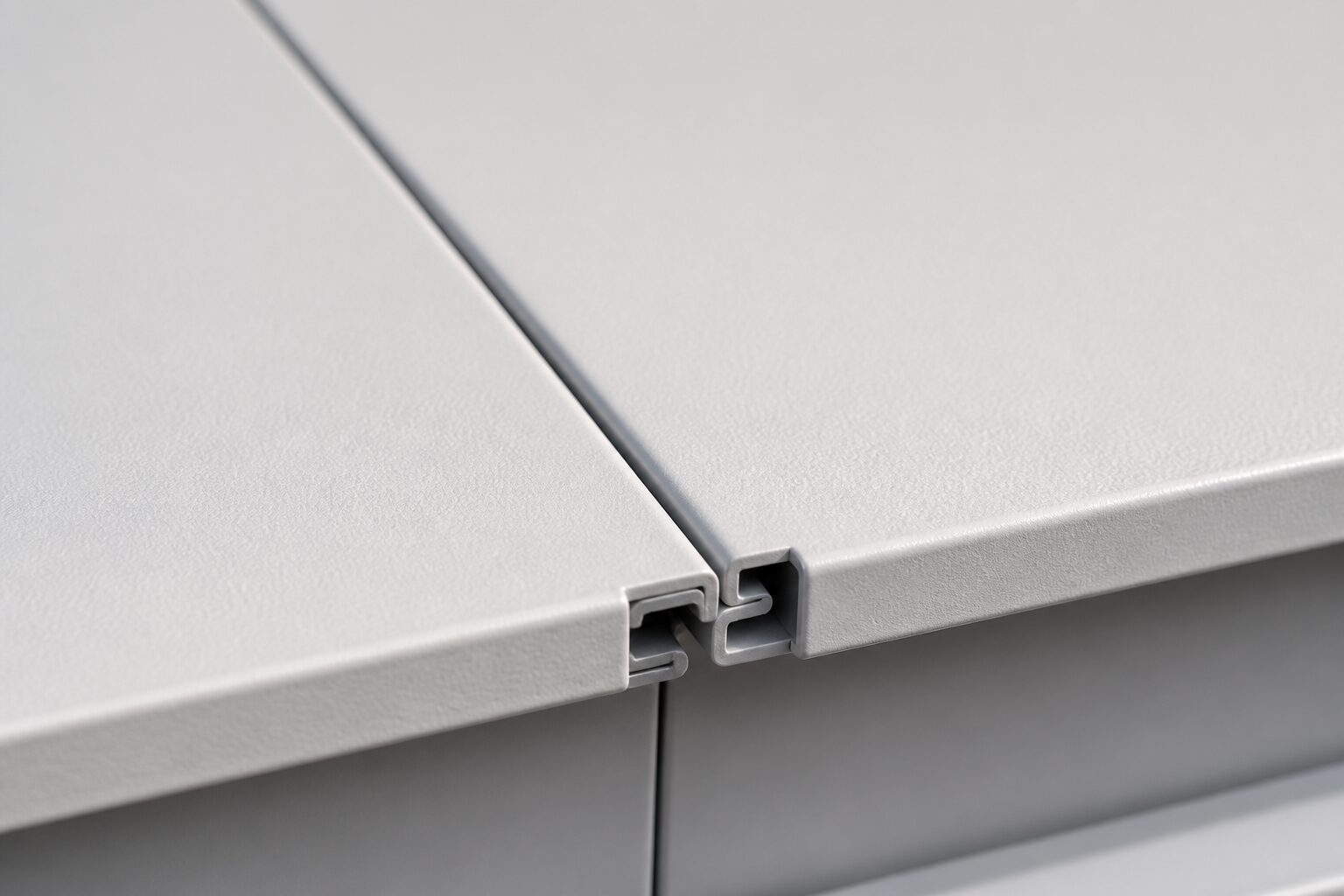Close-up of the concealed interlocking seam between two Heat-Shield aluminium panels